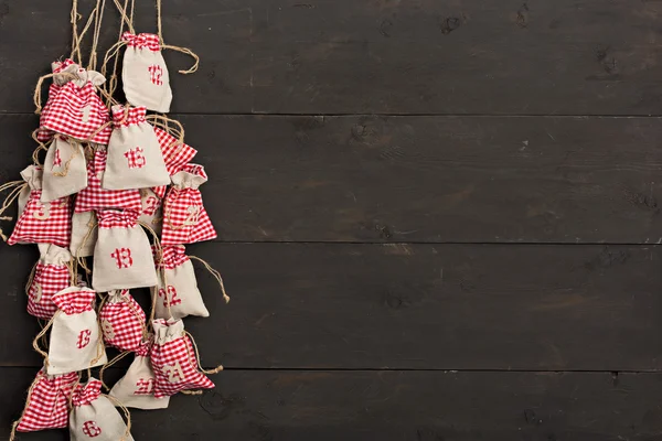 Calendrier de Noël avec fond rustique Photos De Stock Libres De Droits