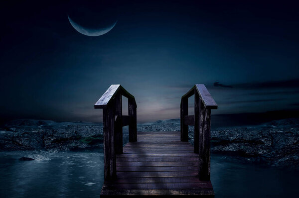 The wooden bridge on the night of the half moon beautifully.