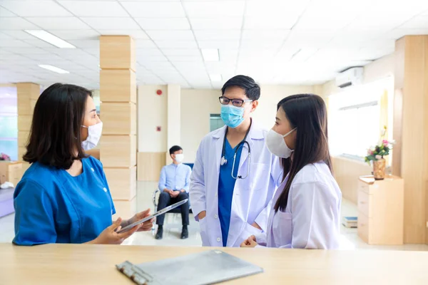 Doctors and nurses in the hospital. Group of doctors in a hospital