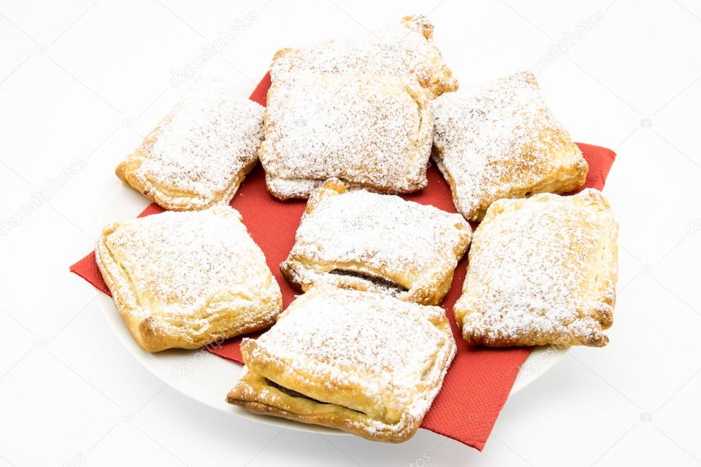 biscuits of puff pastry stuffed with chocolate