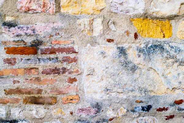 Colored wall made of stone and brick — Stock Photo, Image