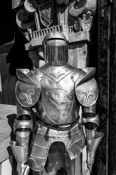 Medieval armor in front of a castle. — Stock Photo, Image