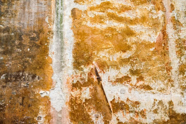 Υπόβαθρο αποτελείται από ένα παλιό κίτρινο τοίχο. — Φωτογραφία Αρχείου