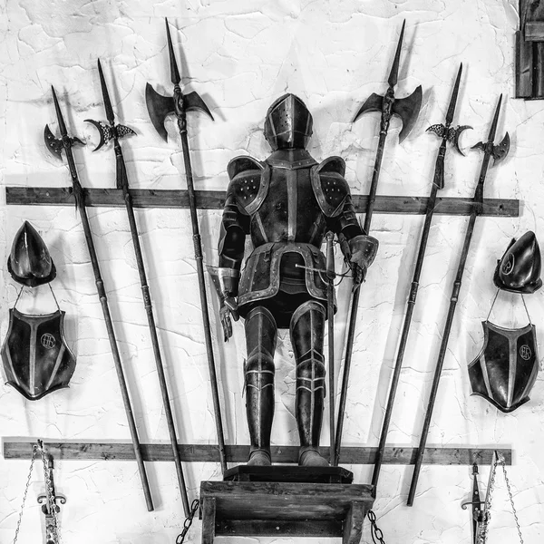 Medieval armor exposed with metal halberds. — Stock Photo, Image