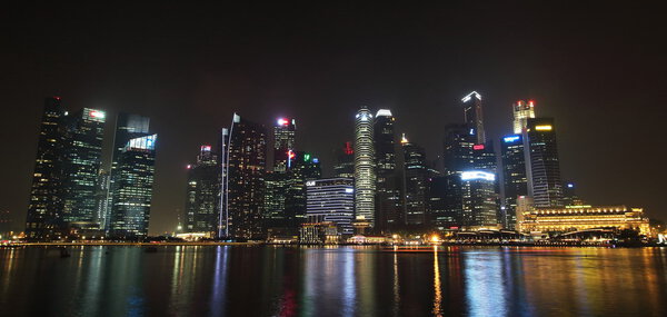 Singapore - October 12th of 2015: Some of the 49 skyscrapers over 140 metres high that can be found in the city are in Marina Bay. The 3,5km waterfront promenade cost $35 million when built in 2008.