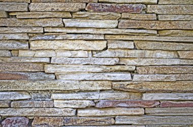 Old wall with horizontal bricks background close up