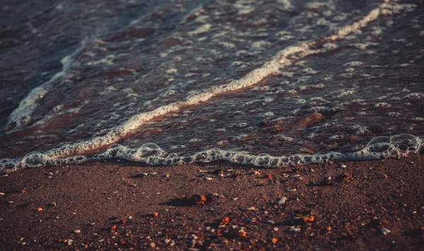 Sand am Meer und ruhige Brandung — Stockfoto