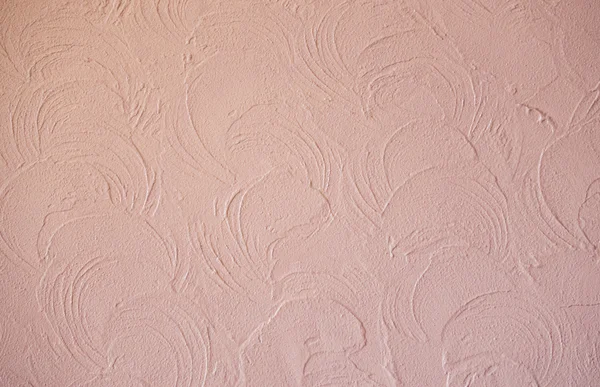 Pink textured plaster with abstract pattern — Stock Photo, Image