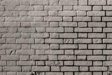 Eski kaba gri tuğla duvarın arka planı ve dokusu