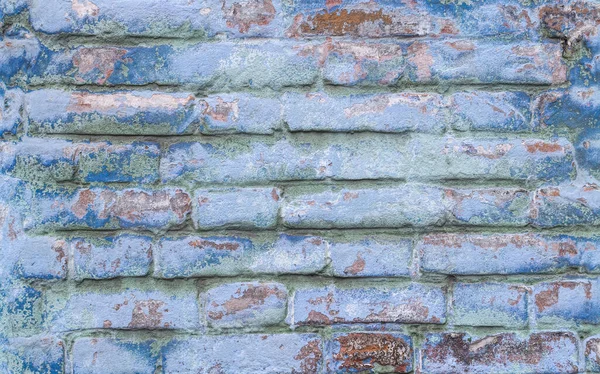 Oude Gebarsten Bakstenen Muur Met Blauwe Schilferende Verf — Stockfoto