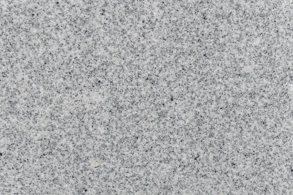Natural texture of gray granite stone. Construction material