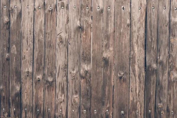 A strong wooden fence made of oak boards — Stock Photo, Image