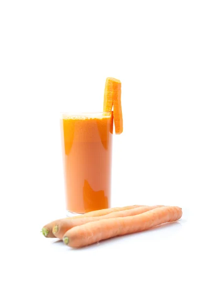 Smoothie made of carrot juice with reflection in glass, white background, isolated — Stock Photo, Image
