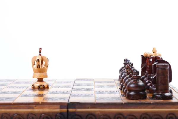 Lonely Chess King versus enemies, white background, text space — Stock Photo, Image