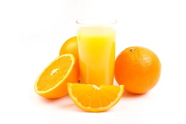 Orange juice with ripe fruits — Stock Photo, Image