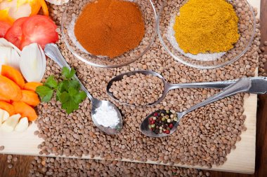 Ingredients for lentil soup, with curry spice, vegetables, clipart