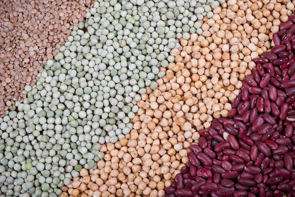 Fondo de textura alimenticia con mezcla de coloridas legumbres —  Fotos de Stock