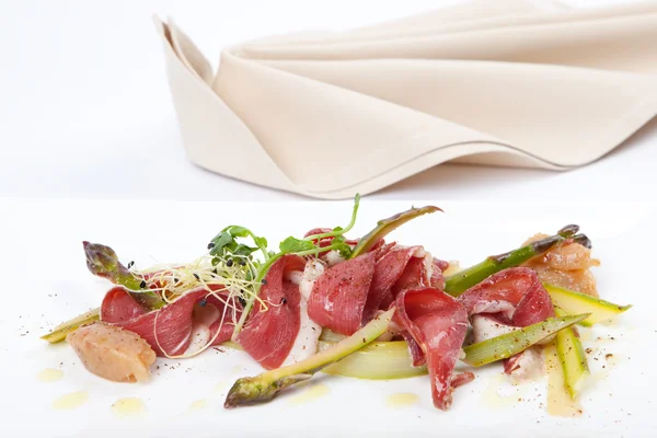 Delicious green marinated asparagus and smoked duck breast, with banana chutney — Stock Photo, Image