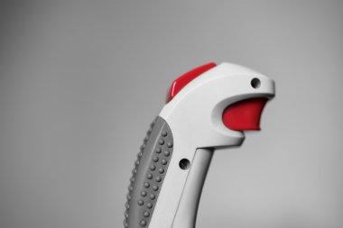 Kırmızı düğmeye bokeh arka plan ile Retro Atari oyun çubuğu