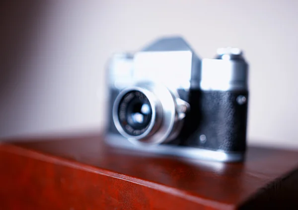 Vintage rangefinder camera bokeh background — Stock Photo, Image