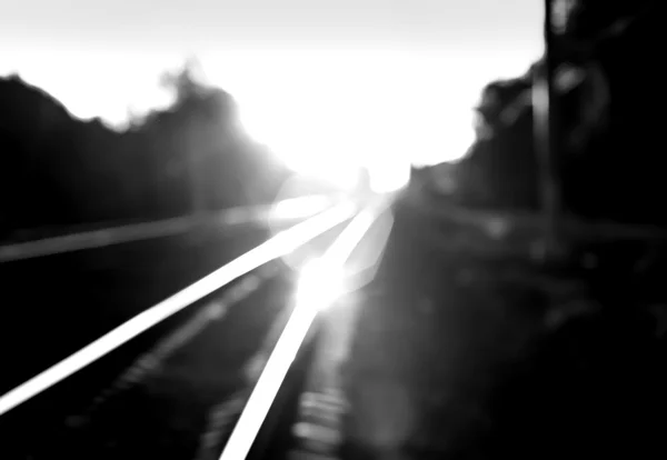 Diagonal brennenden Sonnenuntergang Eisenbahn Bokeh Hintergrund — Stockfoto