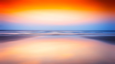 Yatay Okyanusu günbatımı arka plan bulanık