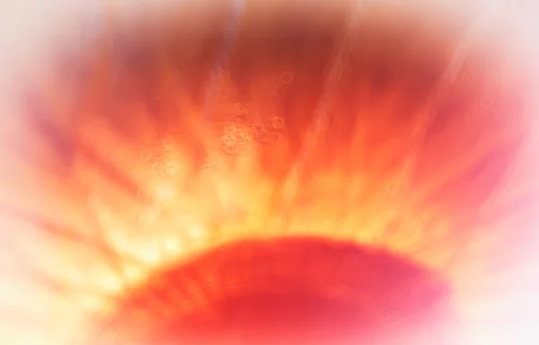 Onderkant uitgelijnd zon abstractie met bokeh achtergrond — Stockfoto