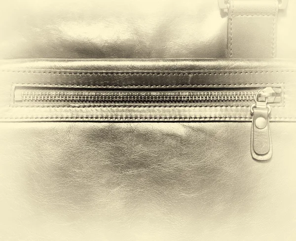 Vízszintes vintage bőr tok zipper matrica háttérrel — Stock Fotó