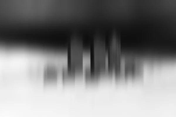 Toy office skyscrapers black and white motion blur background — Stock Photo, Image