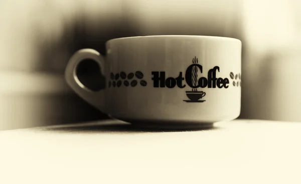 Horizontal Vintage heiße Tasse Kaffee Bokeh Vignette Hintergrund — Stockfoto