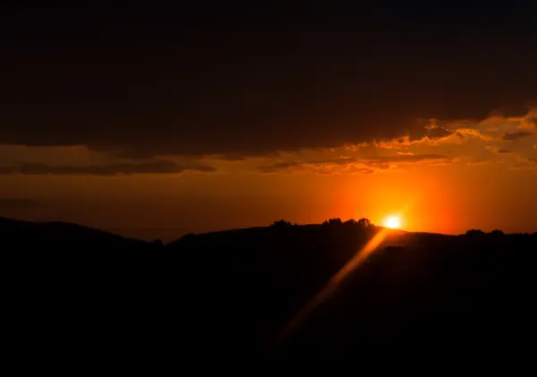 Orange sunset from moving car — Stock Photo, Image