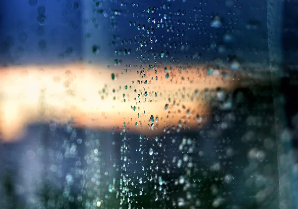 Raindrops on glass abstract background — Stock Photo, Image