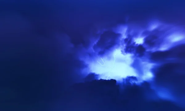 Horizontal vivid vibrant blue lightning storm cloudscape backgro — Stock Photo, Image