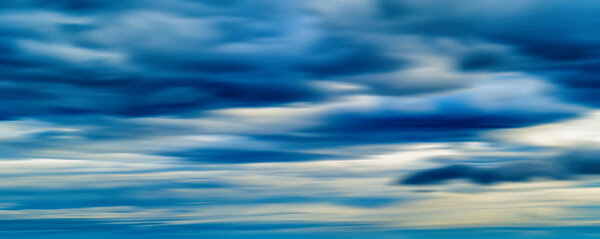 HORIZONTAL VIVID BLUE CLOUDSCAPE DRAMATIC CLOUDS ABSTRACTION BACKGROUND BACKDROP