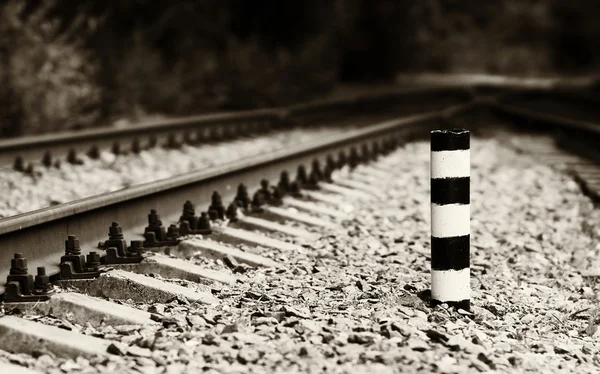 Horizontal sepia railroad milage column bokeh background — Stock Photo, Image