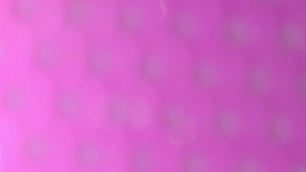 Golden Bokeh Spinning Falling Pink Background — Stock Video