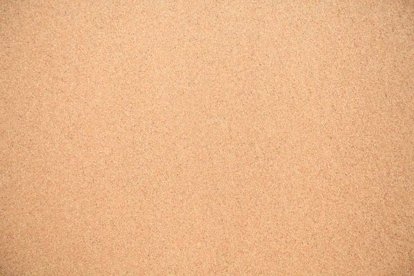 Zandpatroon van een strand in de zomer — Stockfoto