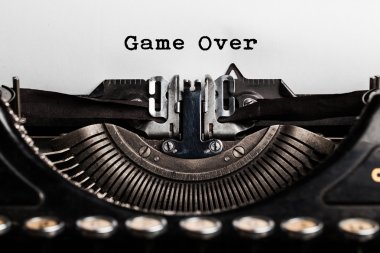 Game over writen by a typewriter clipart