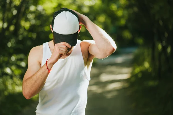 Baseball cap empty mock up on a man — Stock Photo, Image