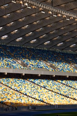 Football or soccer stadium row of seats. Chairs on football stadium