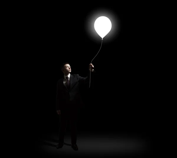 Businessman with idea bulb — Stock Photo, Image