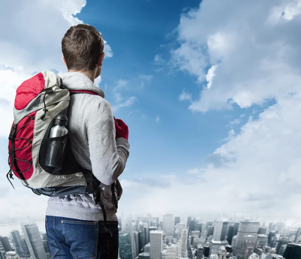 Male Hiker over city panorama — Stock Photo, Image