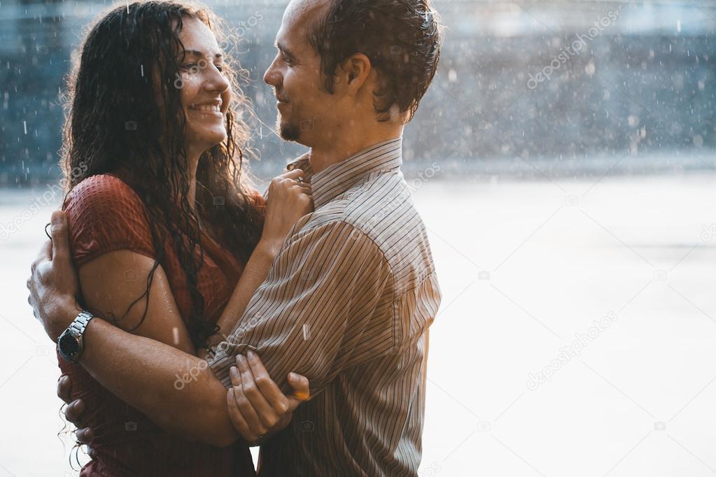 Couple in love under rain