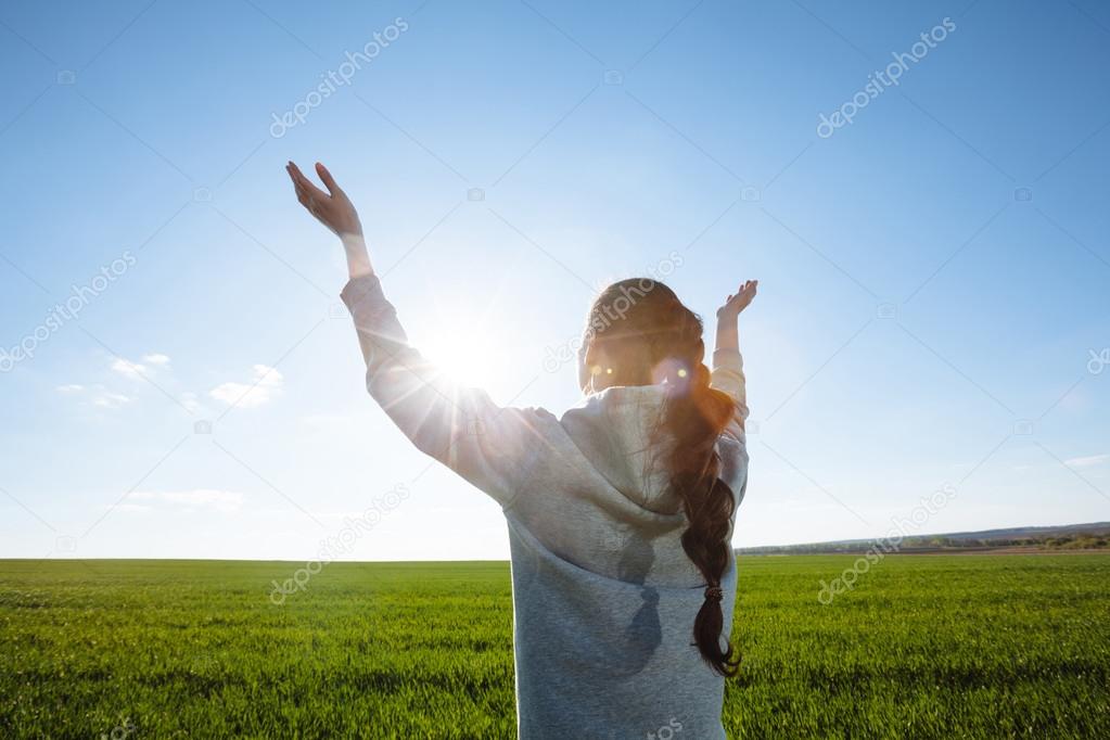 Woman praying outside