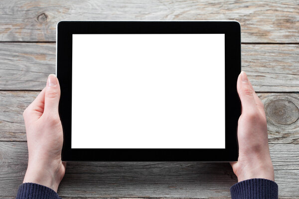 Female hands holding tablet computer
