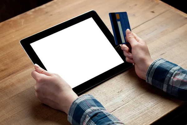 Woman shows screen of digital tablet — Stock Photo, Image