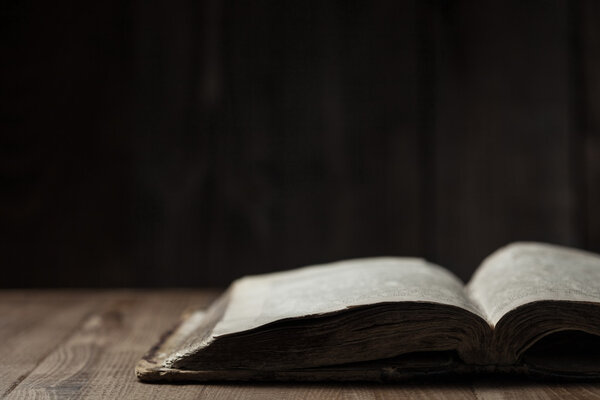 Holy Bible on wooden background