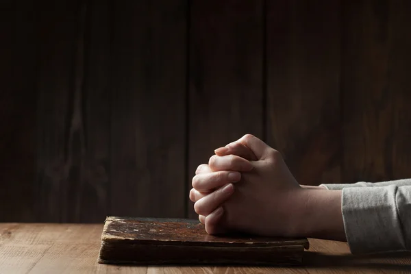 Hands folded in prayer — Stock Photo, Image