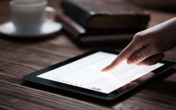 Woman hand presses on screen — Stock Photo, Image