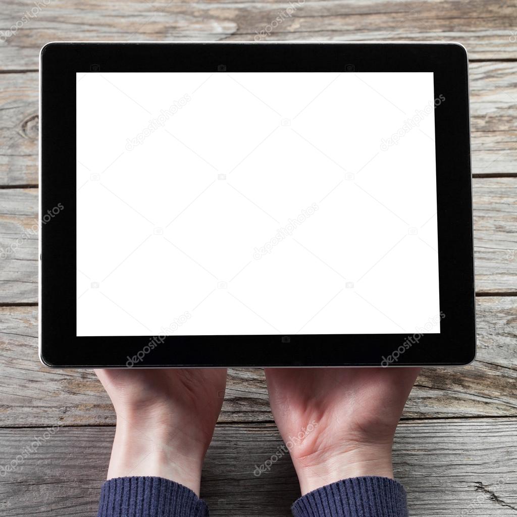 Female hands holding tablet computer